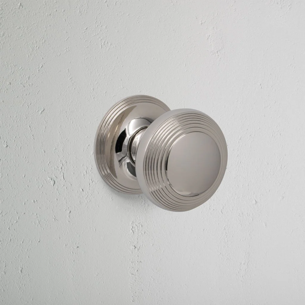 Poplar Unsprung Passage Door Knob Set - Polished Nickel
